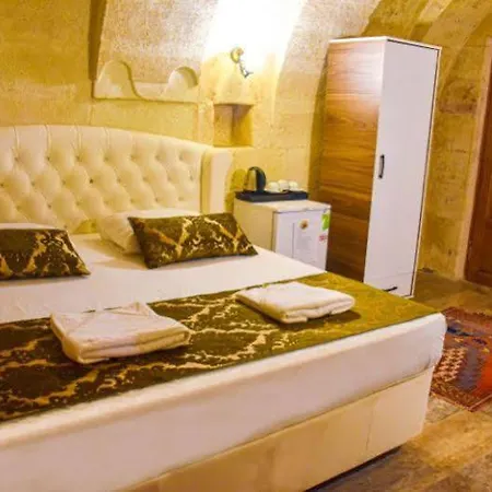 Cappadocia Cave House מלון אורגופ